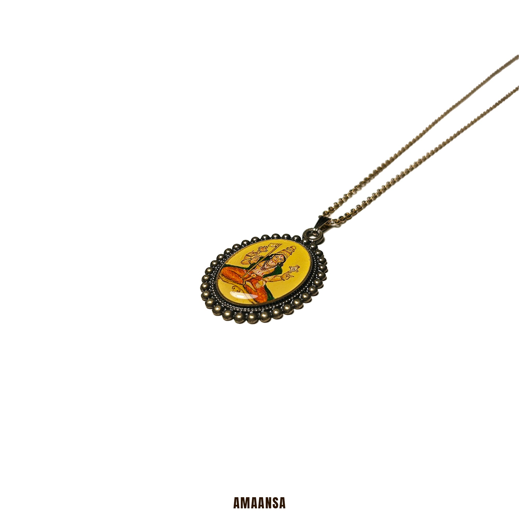 Necklace with a pendant featuring a religious icon on a white background, branded 'Amaansa'. Vintage-style oval locket handpainted Sri Vaikhanasa Maharshi full-body miniature art semicolor pendant Naples yellow background antique patina chain devotional keepsake guru portrait heirloom collectible