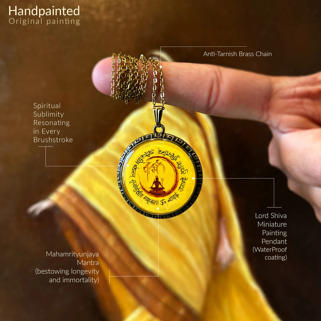 Hand-painted Lord Shiva miniature pendant on a yellow fabric with text detailing its features.
