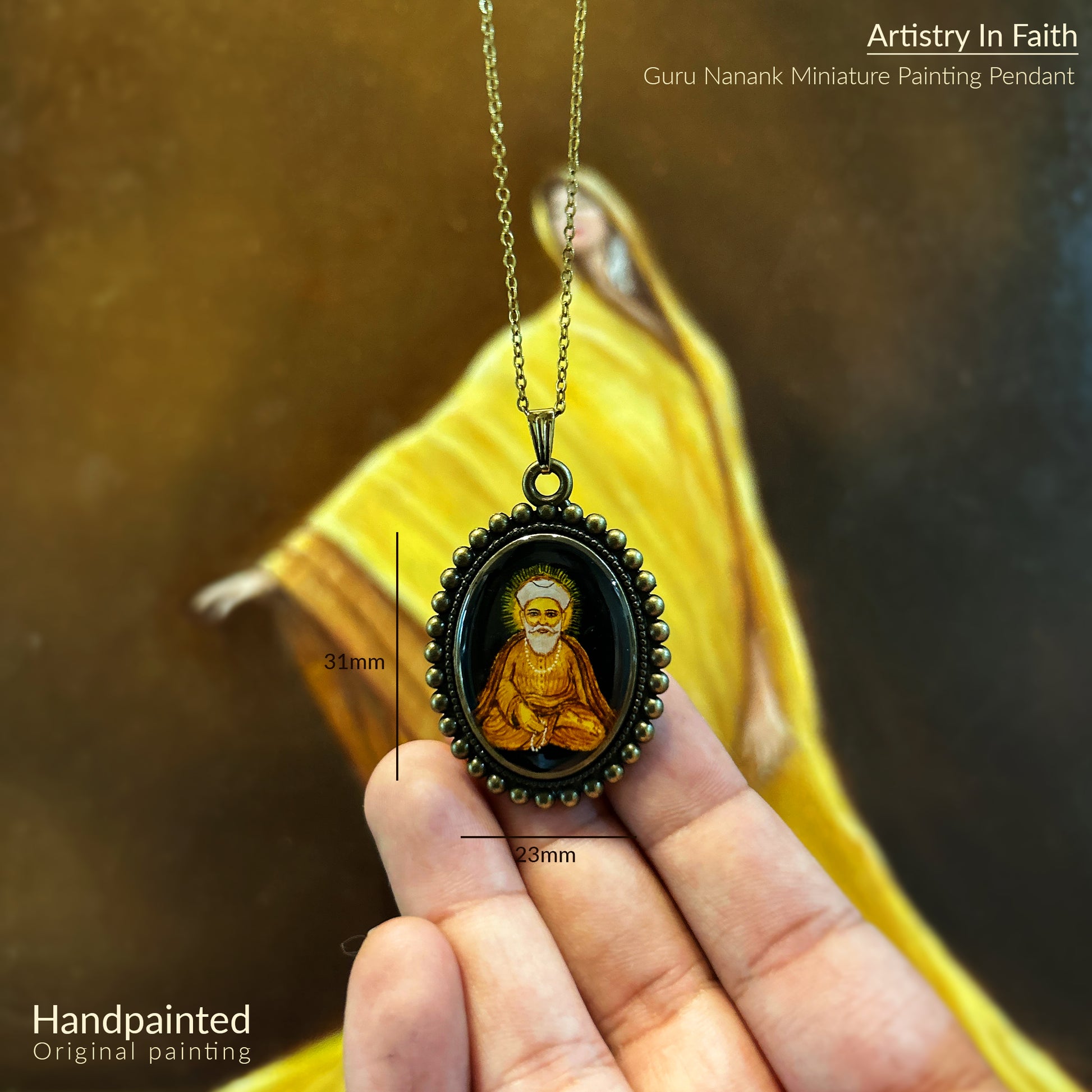 A detailed miniature painting of Guru Nanak ji sitting in an upright meditative pose, set against a black background. A divine glow surrounds his head, symbolizing enlightenment. This custom miniature art is housed in an oval pendant with a vintage-style metal rim, adorned with small bead-like motifs. Guru Nanak ji is shown in traditional attire with a peaceful expression. The wearable pendant comes with a chain, showcasing the intricate artwork in 26mm x 32mm dimensions