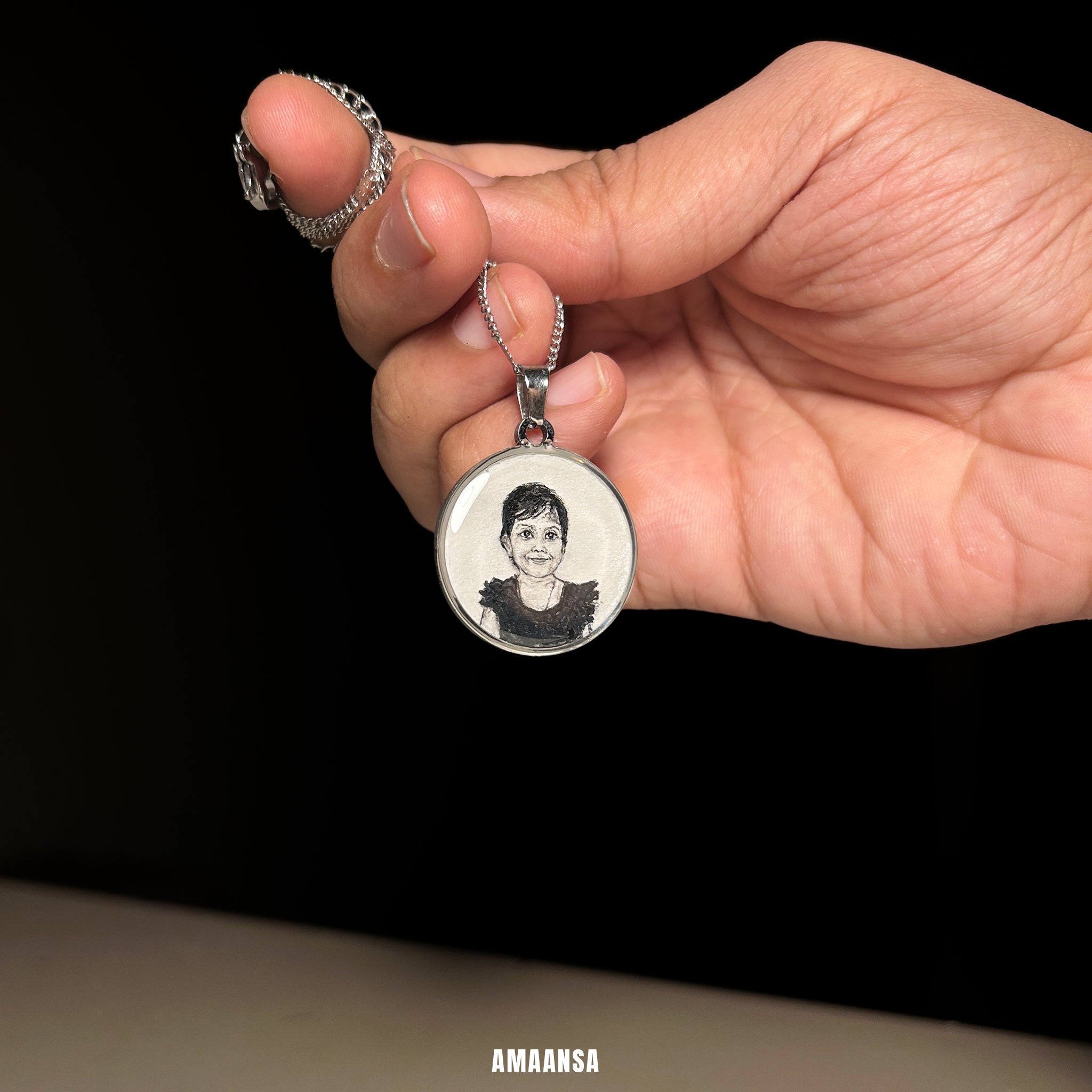 Custom portrait pendant daughter child miniature art silver stainless steel chain 26mm personalized keepsake jewelry father commissioned detailed brushwork heirloom piece wearable family treasure black background