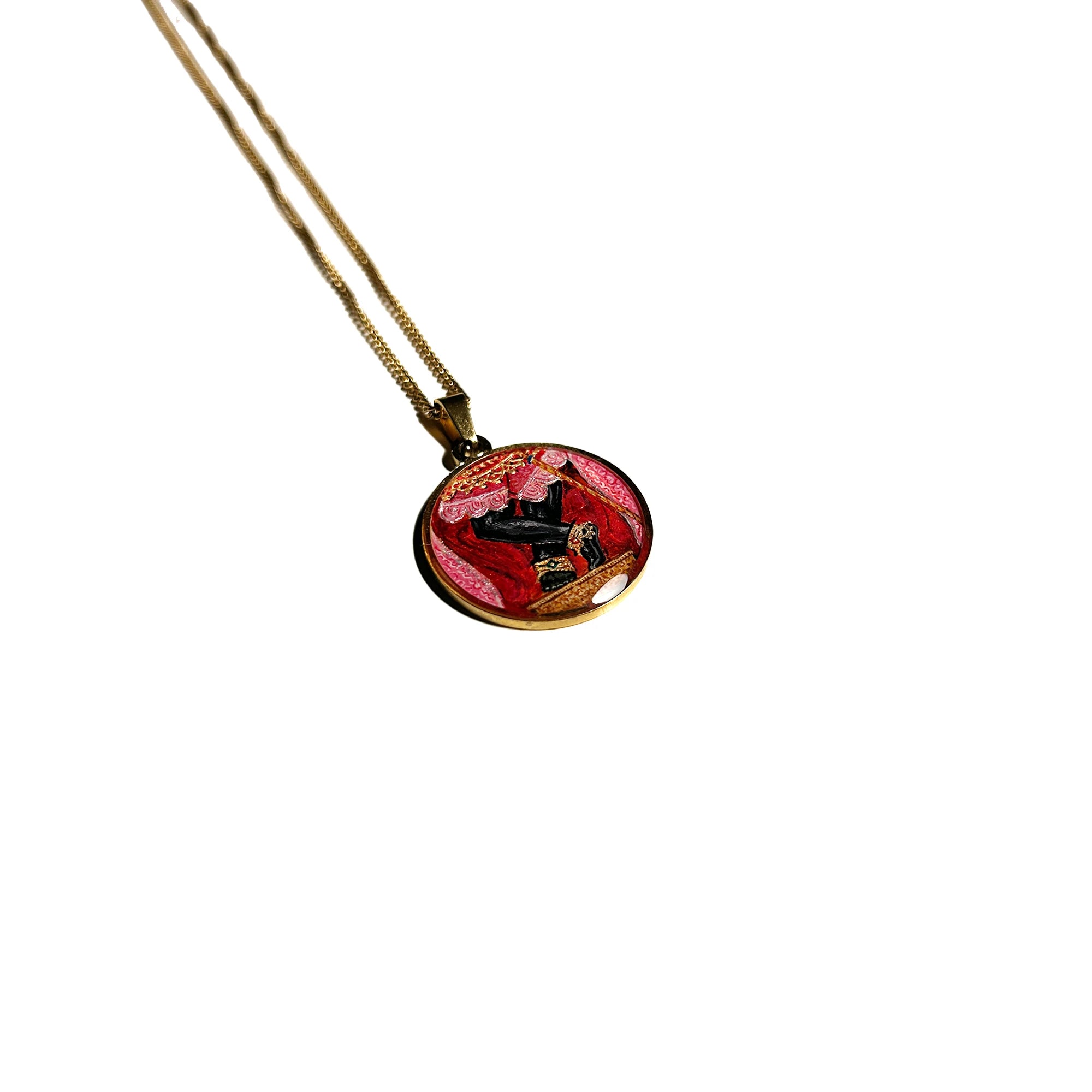 18k gold‑plated Sri Radharamanji paduka pendant on chain, hand‑painted miniature shown against soft neutral background for spiritual jewelry.