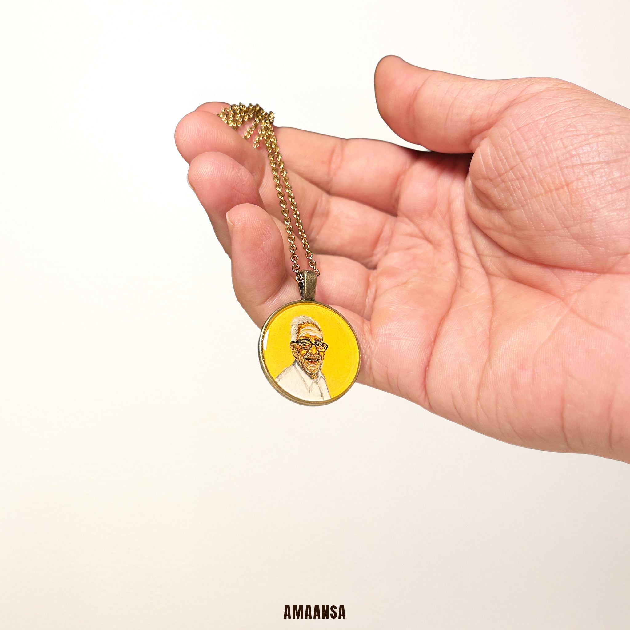 Antique-style pendant handpainted grandfather portrait vintage heirloom Naples yellow background brown black hues aged metal chain heartfelt keepsake grandson commissioned cheeky smile memory preservation