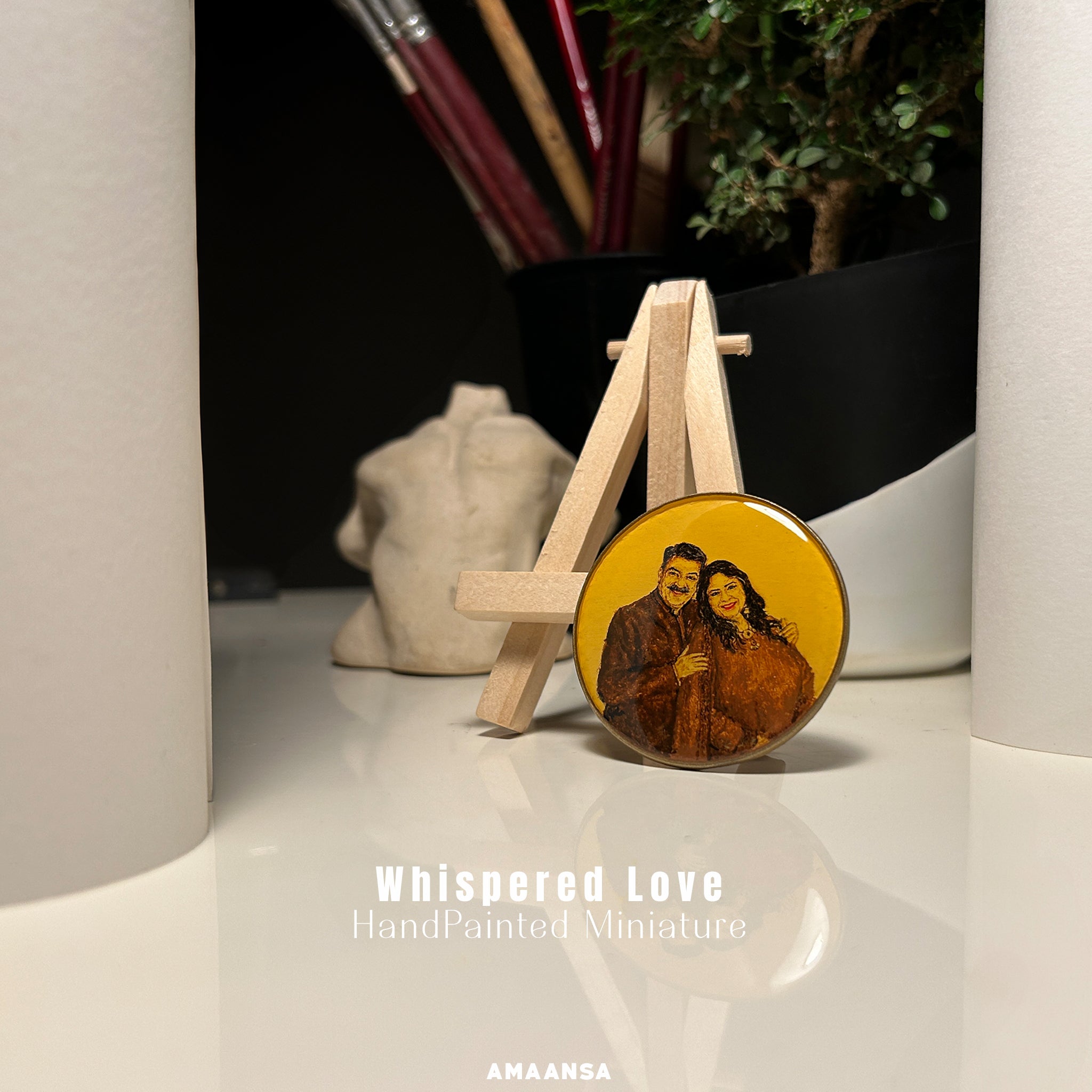 SMARAN collection 50mm heirloom portrait capturing couple's radiant smiles, her flowing curly hair framing her face, his gentle eyes and mustache, his protective hand on her shoulder, meticulously painted in sepia and burnt umber against vintage yellow background