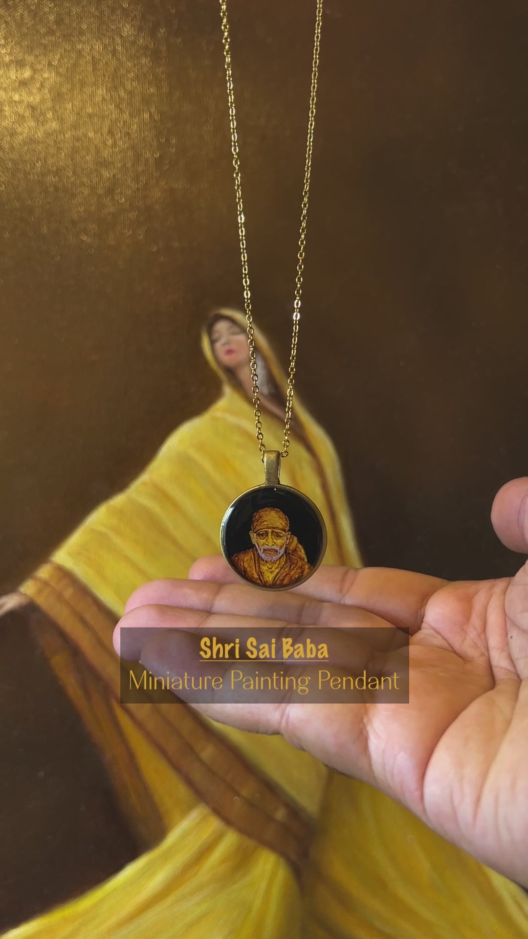Behind AMAANSA's sacred art: 28-second glimpse into the creation of Shirdi Sai Baba's miniature portrait (26mm). Opening with the completed pendant, then revealing the artistic journey - from first brushstroke to divine completion. Witness the careful layering technique bringing Baba's features to life: gentle eyes, flowing beard, and benevolent expression. Scale shown by 1-rupee coin, highlighting the remarkable detail achieved in this spiritual keepsake. Set to peaceful background music.