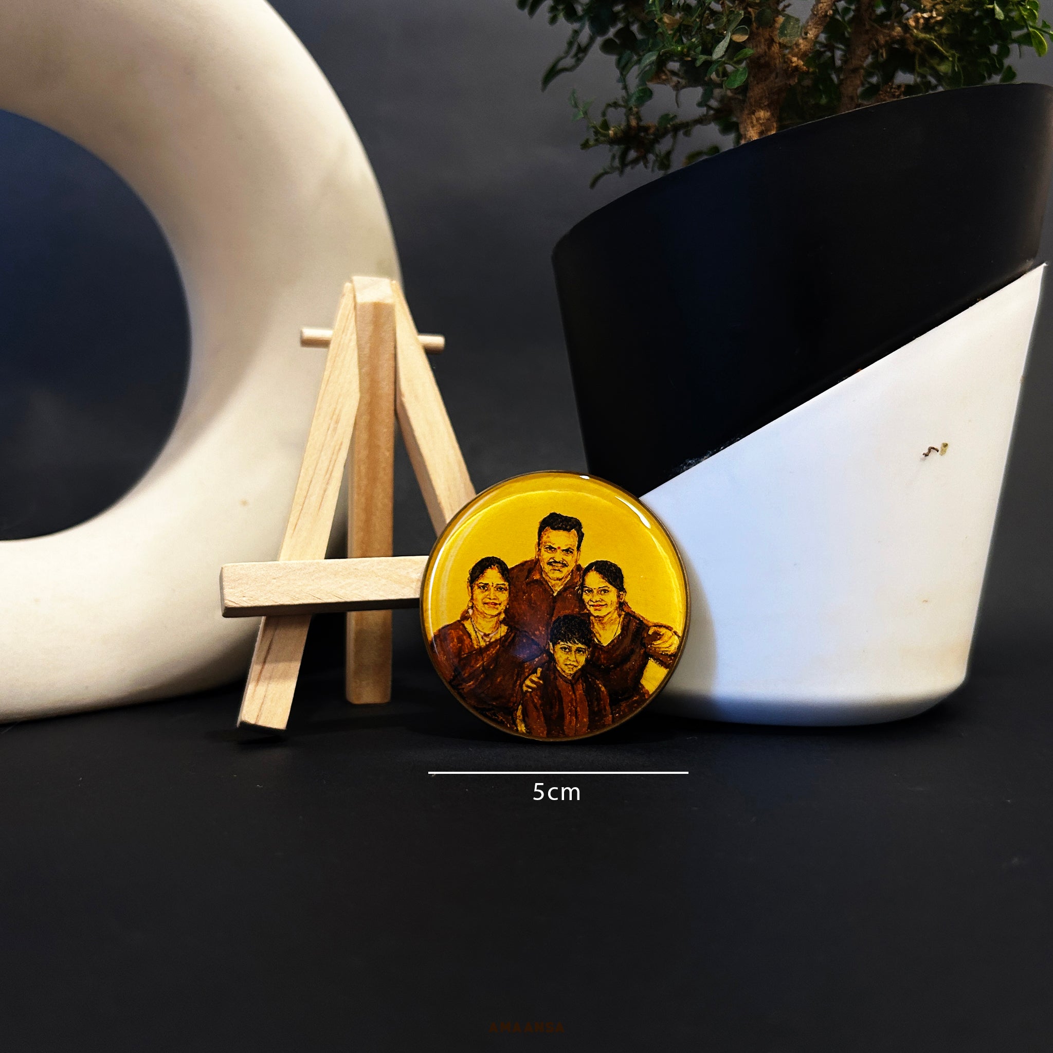 Hand-painted custom miniature portrait of a family of four in a 5cm diameter circular tabletop showpiece. The father is positioned behind the family, hands resting on the mother and daughter’s shoulders, while the son stands between them. Painted with precise detail on a yellow background, capturing the essence of familial warmth. This miniature artwork emphasizes the skill and challenge of working at such a small scale. Painting is protected by a metal base on the back and a resin coating on the front